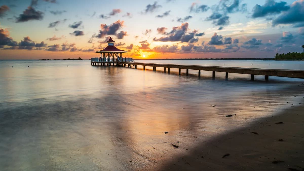 a pier that is sitting in the water